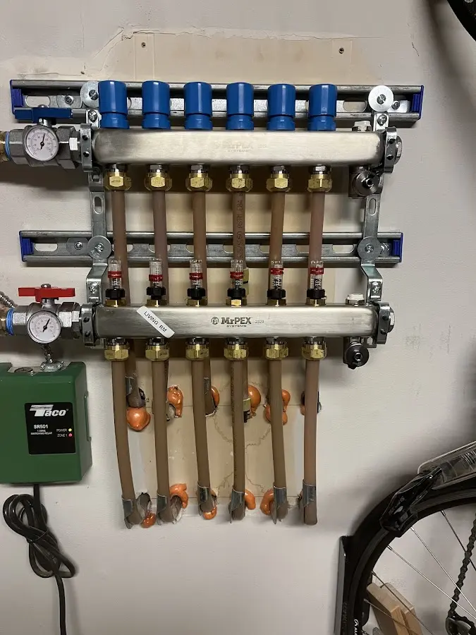 Plumber performing Water Heater Repair at a residential property in Alamo